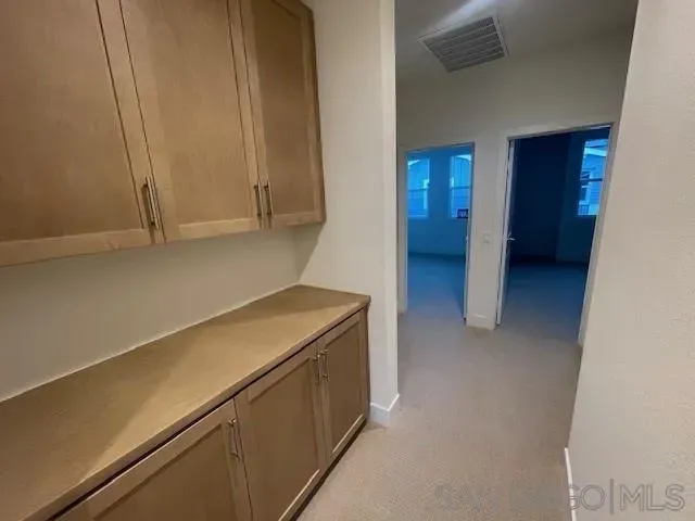 a room with storage and utility