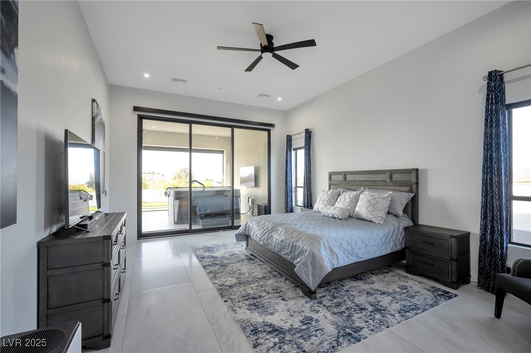 600 Quail Covey Road Henderson, NV 89002 - Photo 17 of 42 Primary Bedroom with recessed lighting, access to exterior jacuzzi, and a ceiling fan