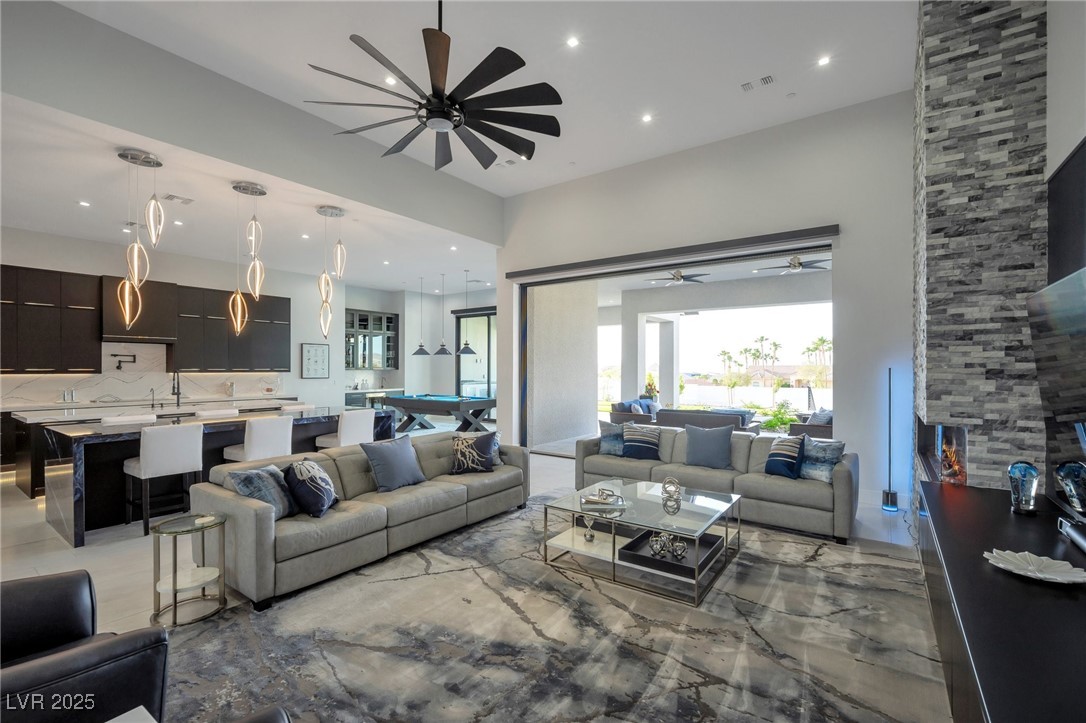 600 Quail Covey Road Henderson, NV 89002 - Photo 41 of 42 Open floor plan of living area with ceiling fan, recessed lighting