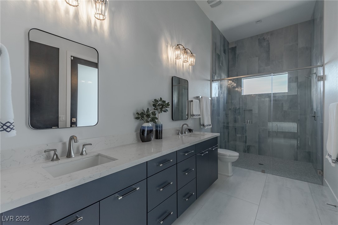 600 Quail Covey Road Henderson, NV 89002 - Photo 38 of 42 Guest suit with full bath,double sink, and shower stall