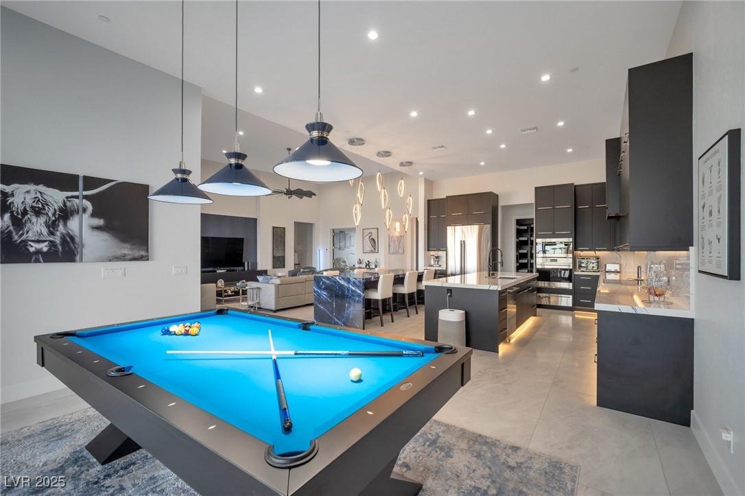 600 Quail Covey Road Henderson, NV 89002 - Photo 3 of 42 Pool table in dinning room area, with recessed lighting