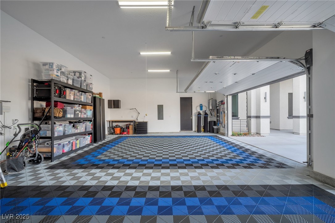 600 Quail Covey Road Henderson, NV 89002 - Photo 4 of 42 3-car garage with 50 amp electric Tesla car charger outlet
