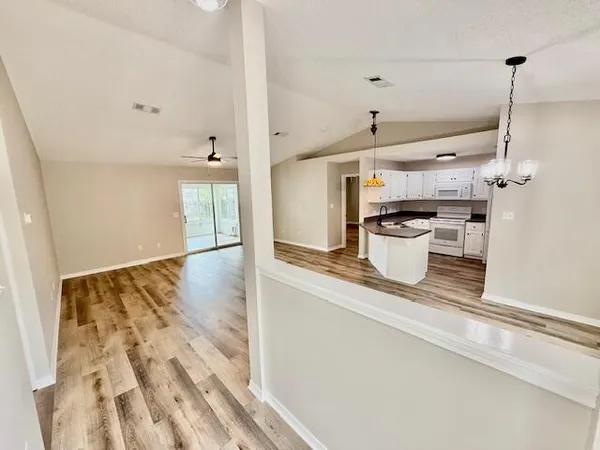 a view of a kitchen with a sink