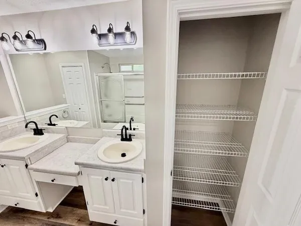 a view of a room with racks on the wall