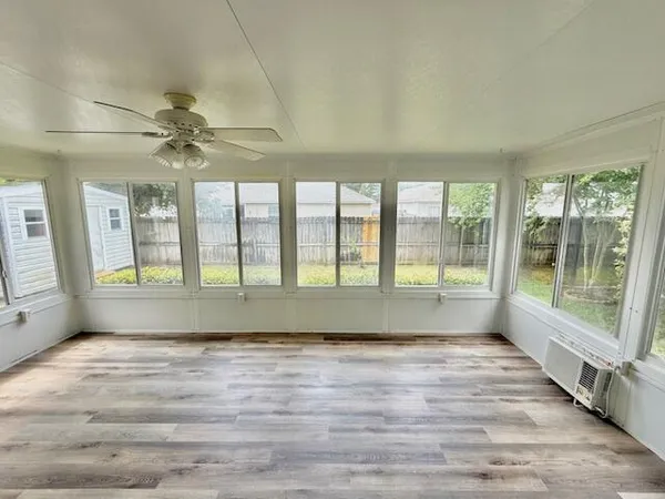 a view of a room with racks on the wall