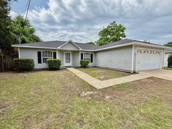 a house view with a garden space