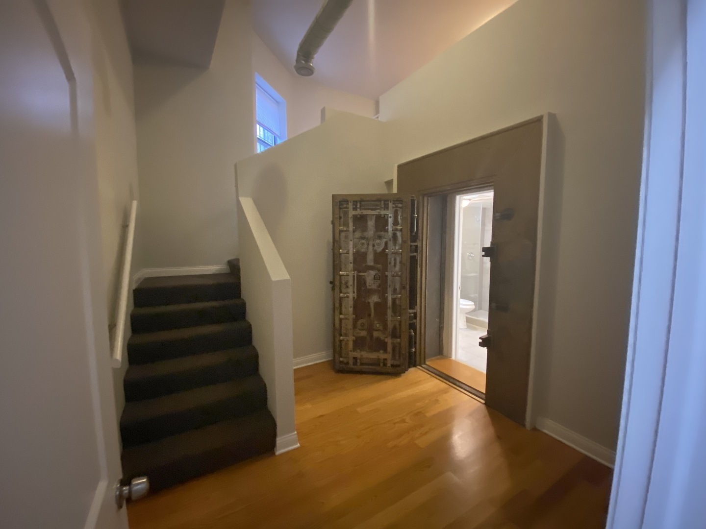 Undisclosed Address Chicago, IL 60613 - Photo 5 of 14 a view of entryway with wooden floor