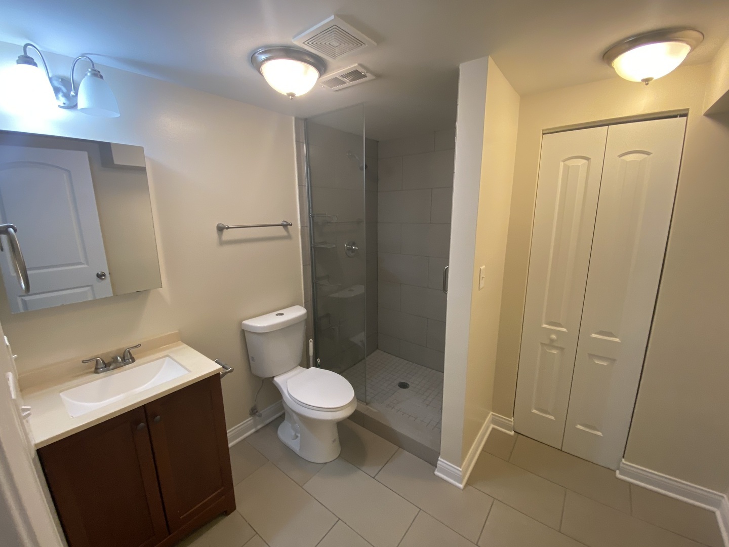 Undisclosed Address Chicago, IL 60613 - Photo 6 of 14 a bathroom with a sink toilet and shower