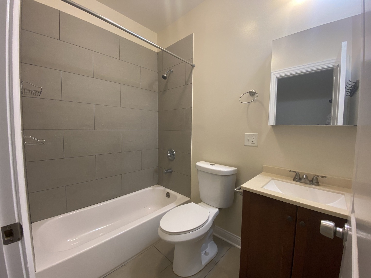 Undisclosed Address Chicago, IL 60613 - Photo 7 of 14 a bathroom with a sink a toilet and shower