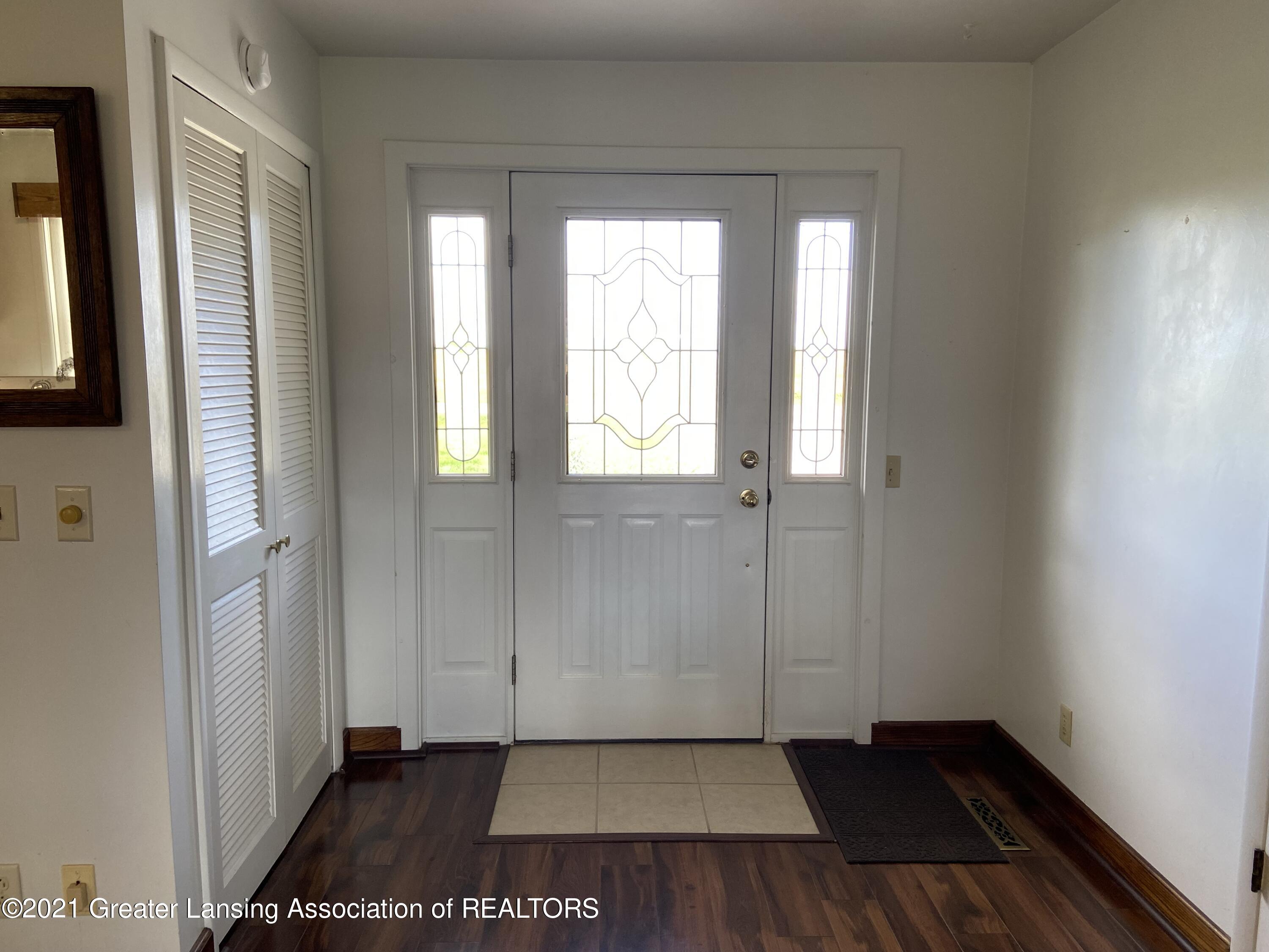 1223 South Dewitt Road St. Johns, MI 48879 - Photo 7 of 31 formal entrance