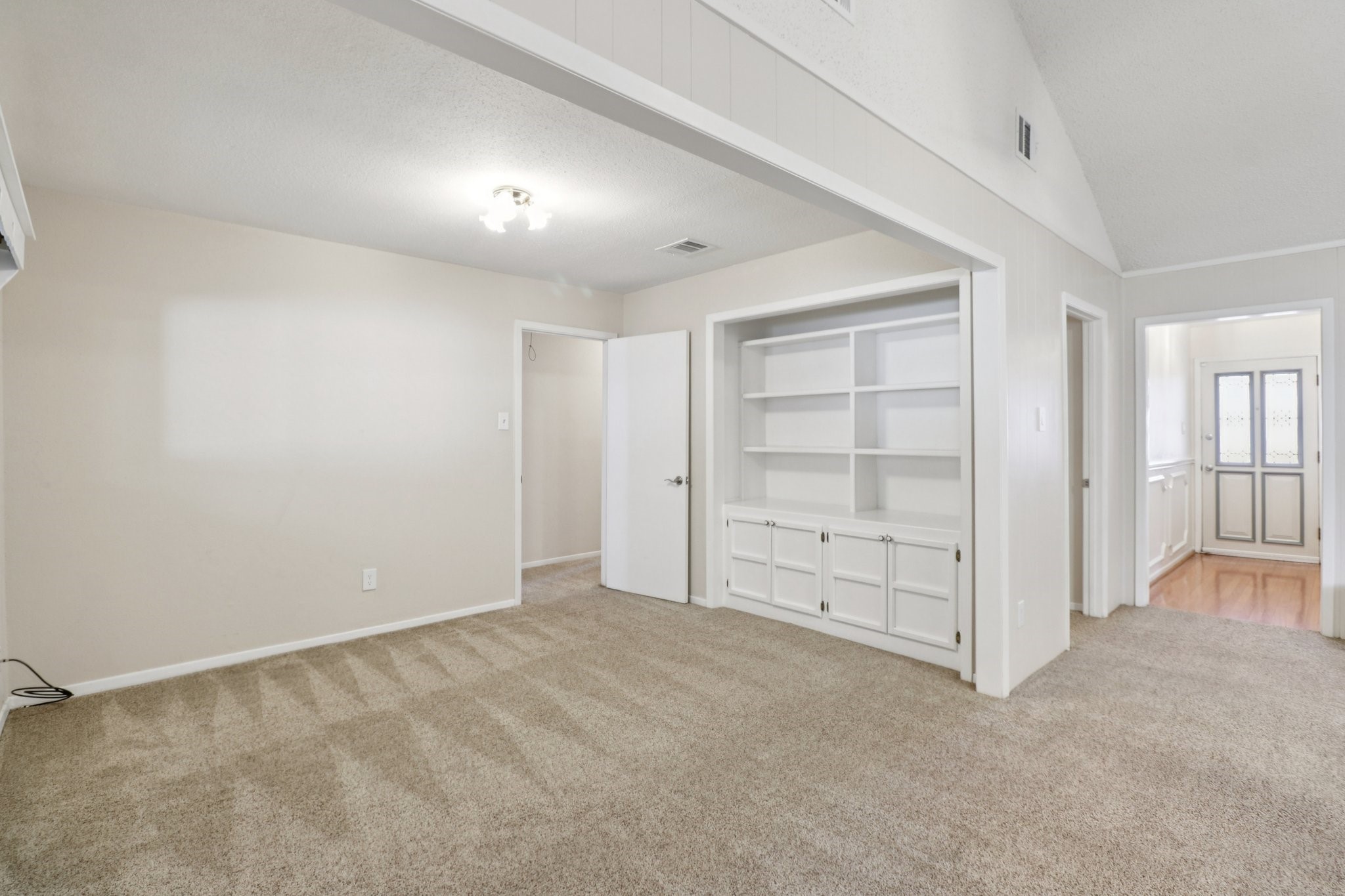 11118 Cedarview Lane Houston, TX 77041 - Photo 4 of 15 a view of an empty room with a window