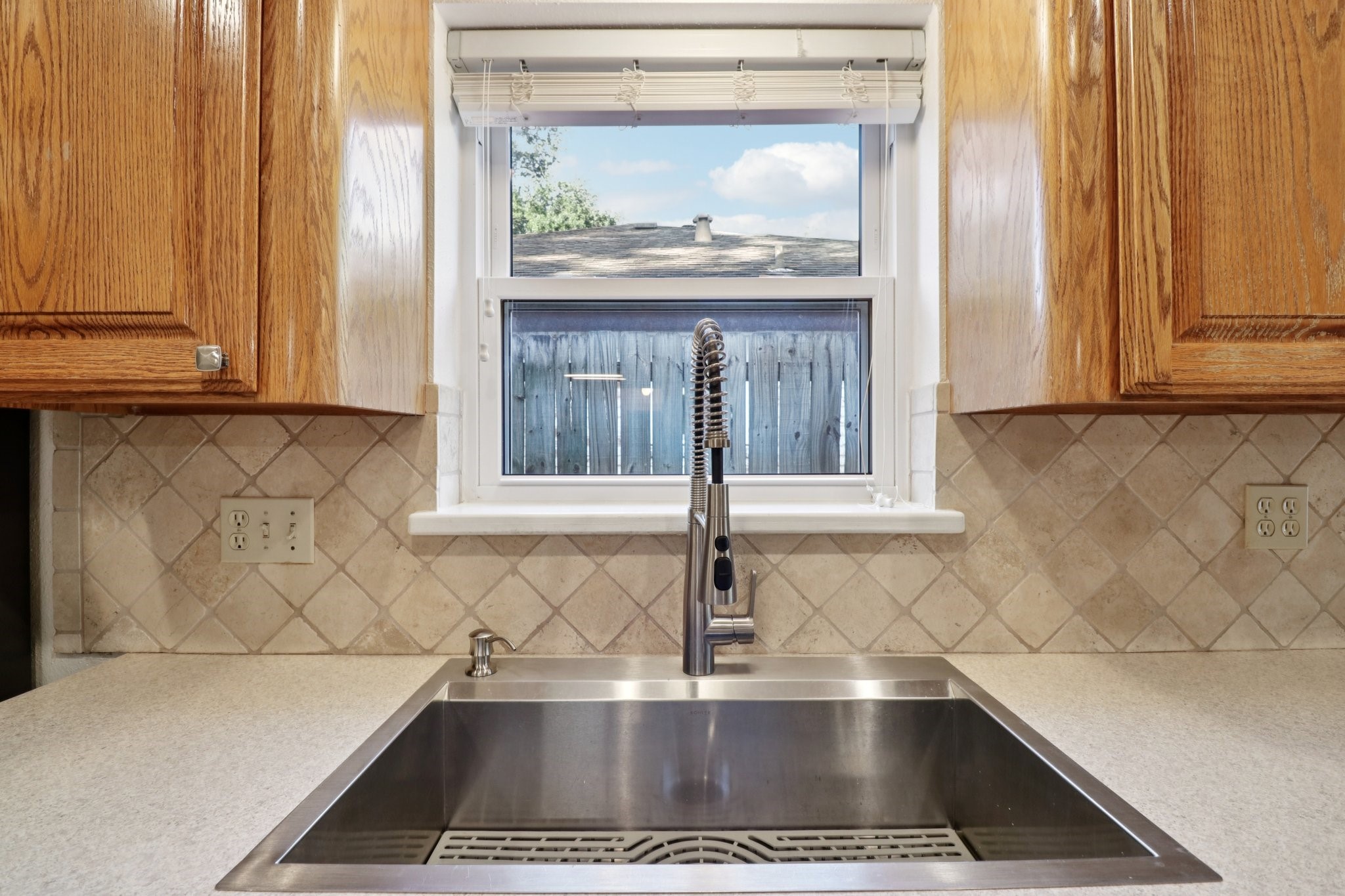 11118 Cedarview Lane Houston, TX 77041 - Photo 6 of 15 a view of a kitchen that has a sink and a window