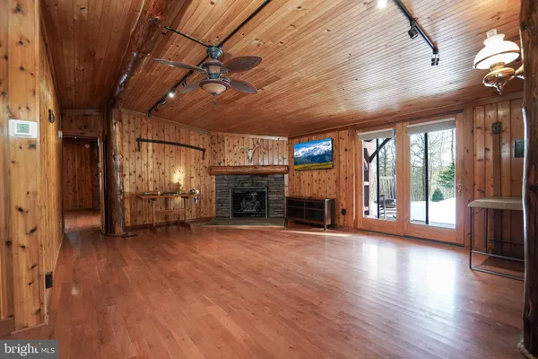a bedroom with furniture and window