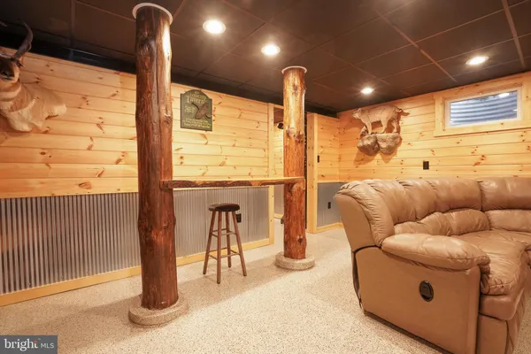 a view of a projector room with a table and chairs