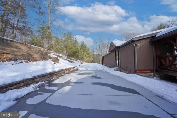 a kitchen with stainless steel appliances granite countertop a stove a sink and dishwasher