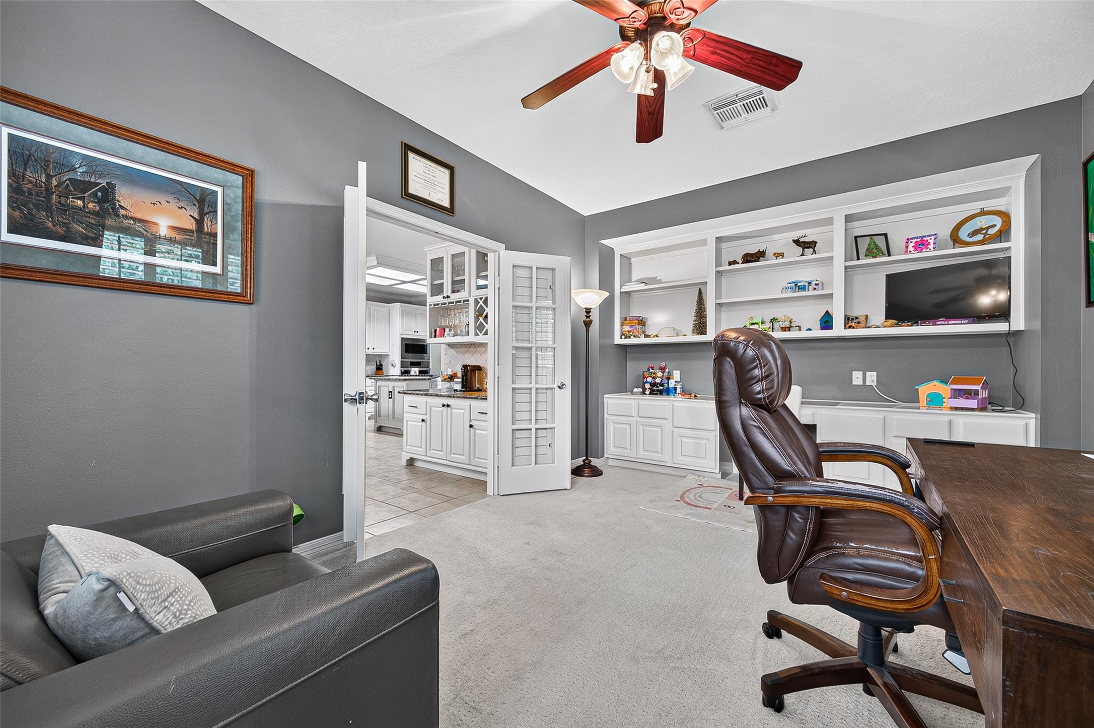 11822 Rue Beaujon Court Tomball, TX 77377 - Photo 14 of 50 Home Office has a lovely built-in on the south wall and Doors for privacy.