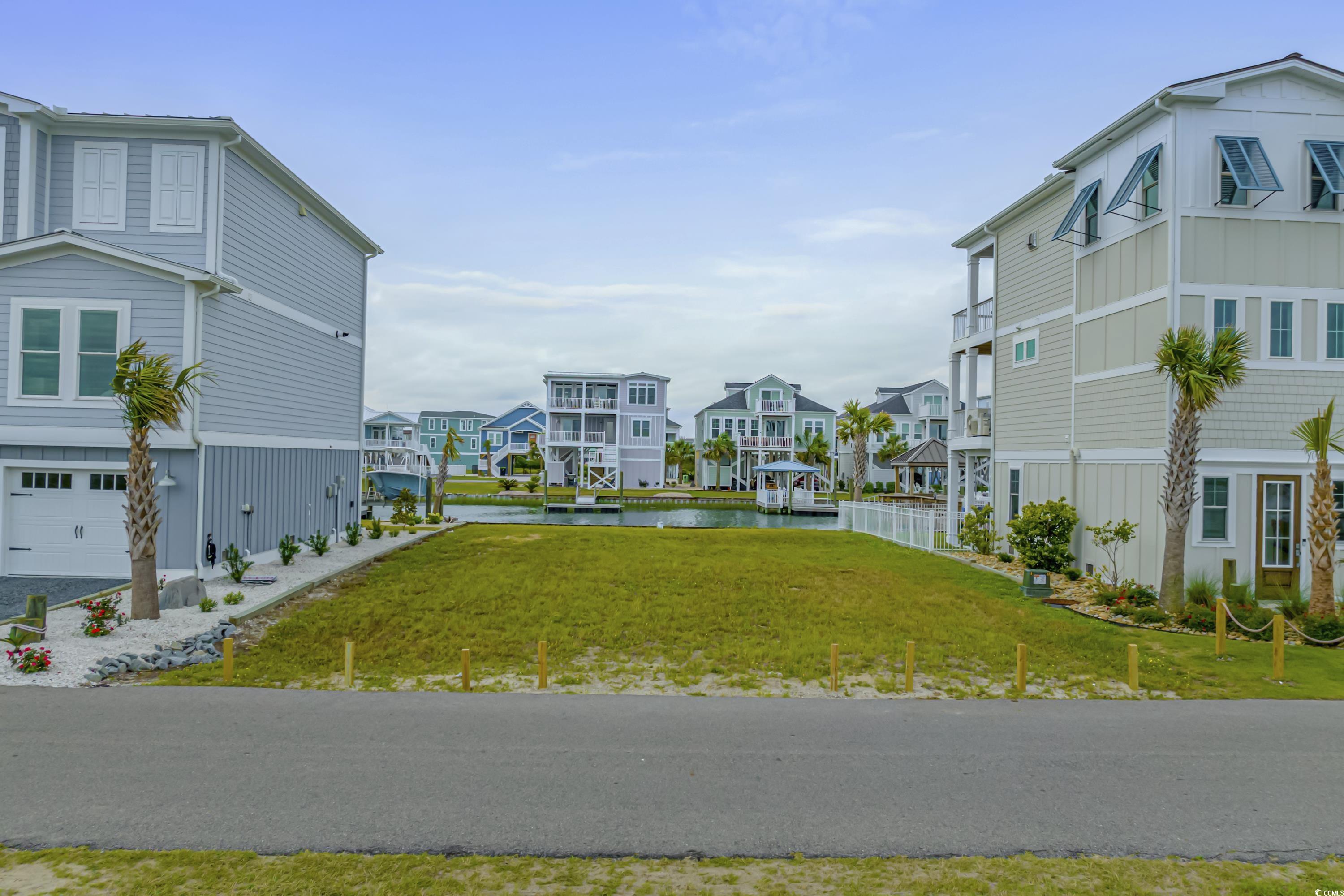 1310 Riverside Drive Sunset Beach, NC 28468 - Photo 5 of 13 Surrounding community featuring a residential view