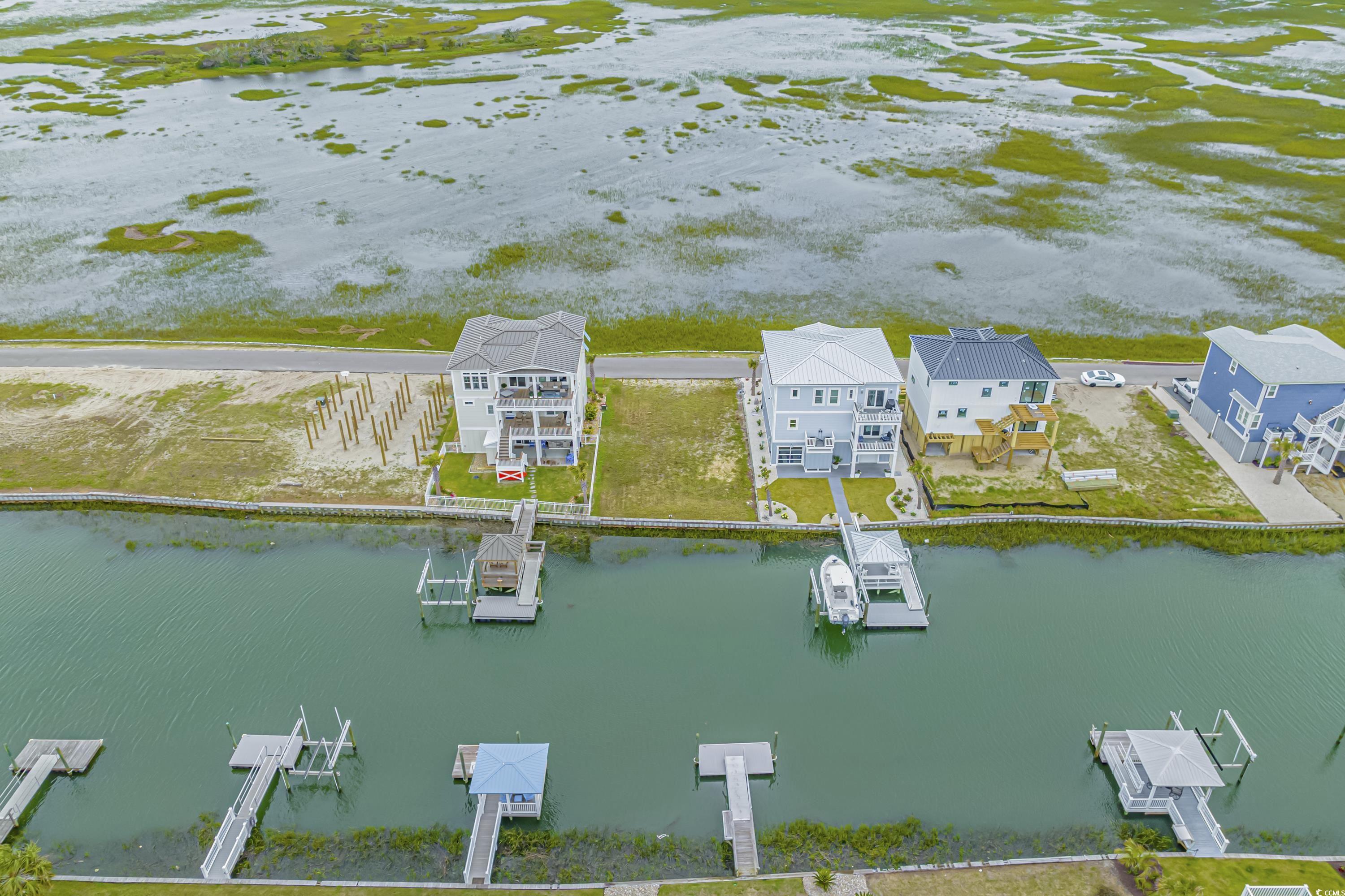 1310 Riverside Drive Sunset Beach, NC 28468 - Photo 6 of 13 Bird's eye view of a large body of water