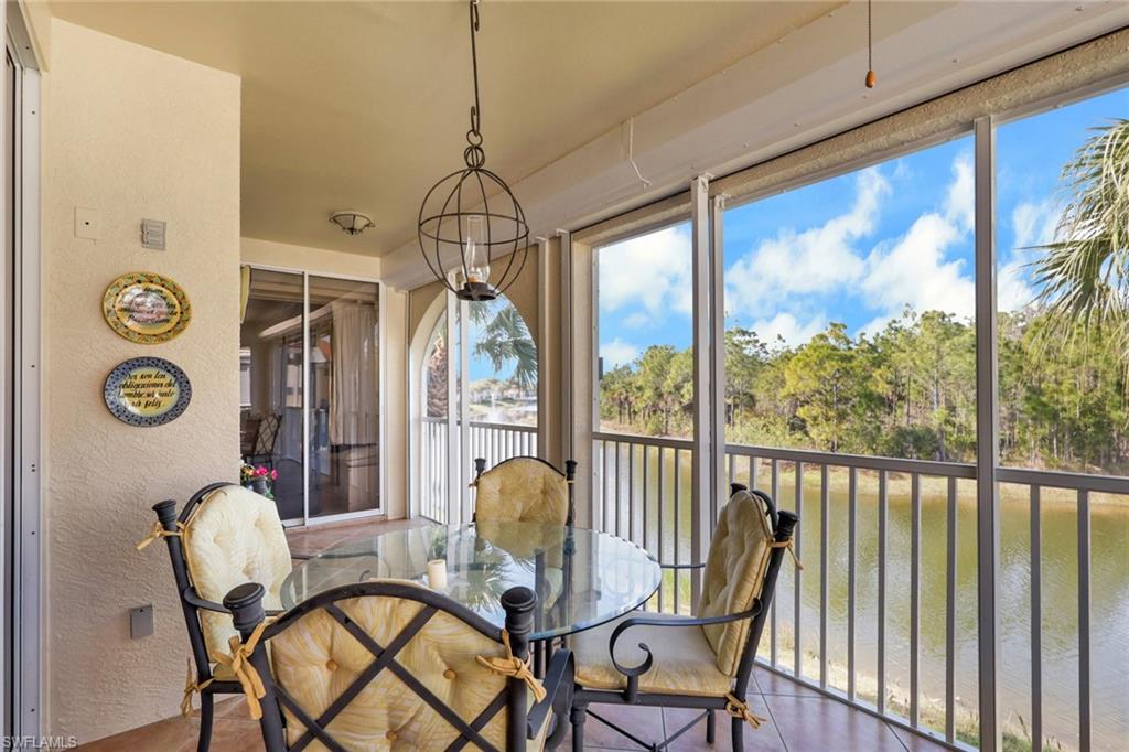 10801 Crooked River Road, Unit 203 Estero, FL 34135 - Photo 27 of 27 a view of a chairs and table in a balcony