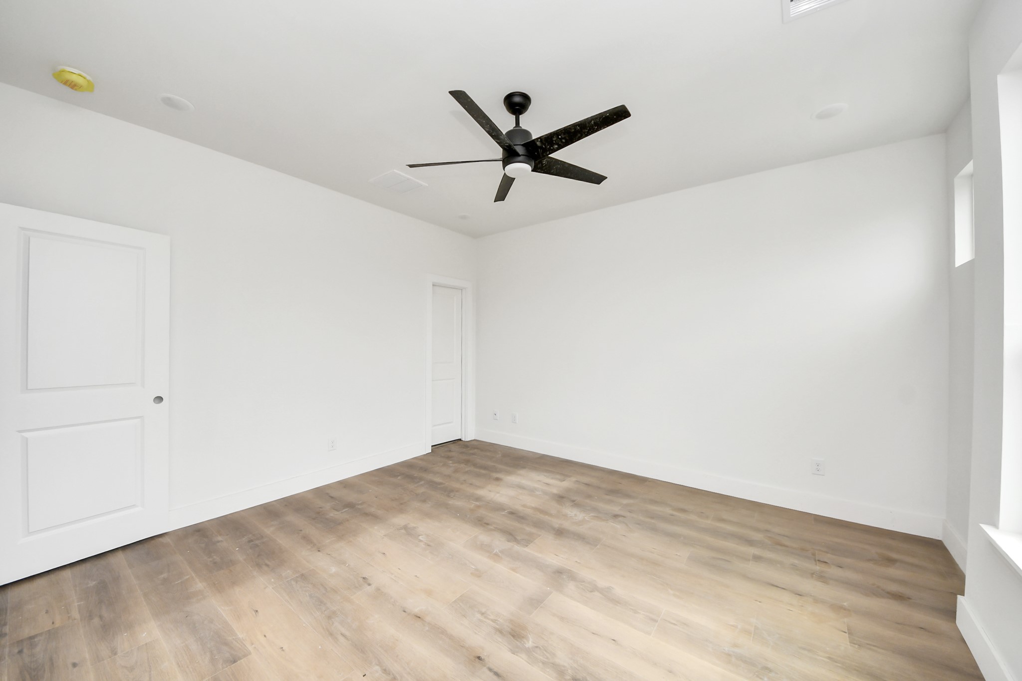 8206 Colonial Lane Houston, TX 77051 - Photo 24 of 31 a view of a big room with wooden floor