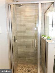 2605 Harrington Road Chester, MD 21619 - Photo 11 of 29 a bathroom with a shower