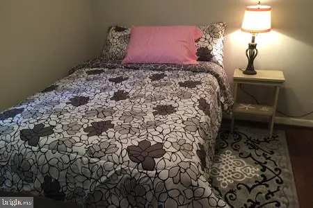 a white toilet sitting next to a window