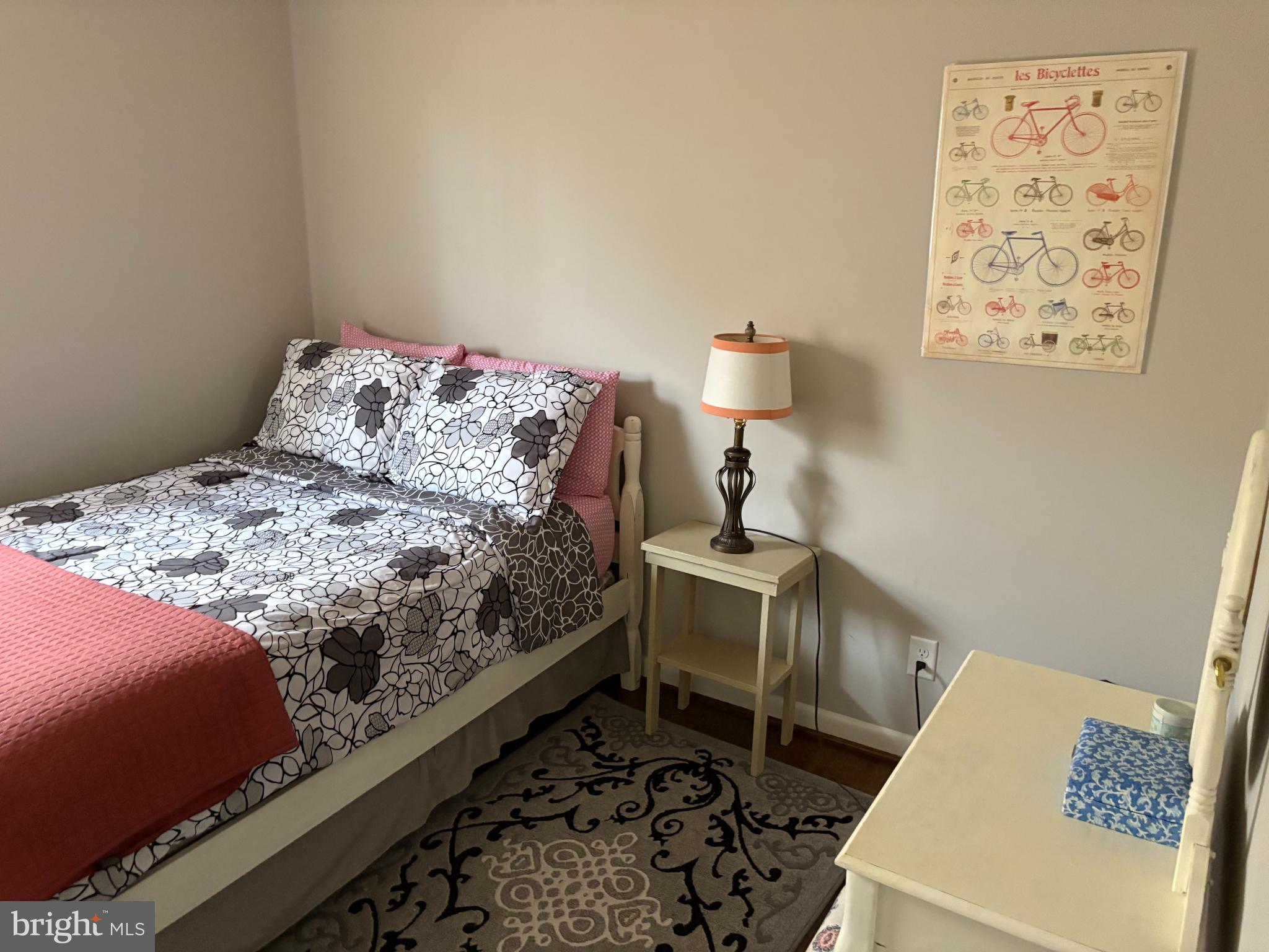 2605 Harrington Road Chester, MD 21619 - Photo 18 of 27 a bedroom with a bed and a desk