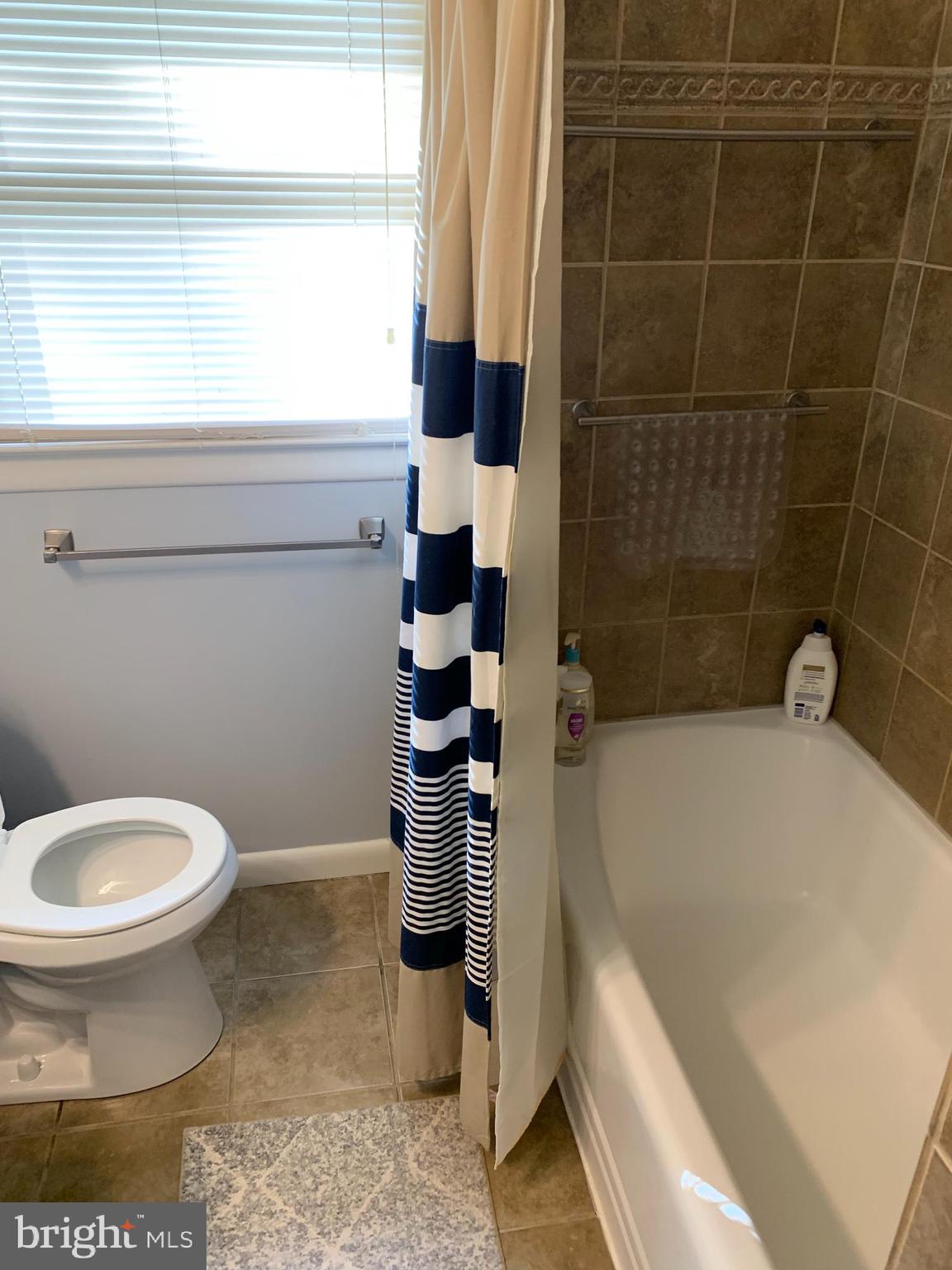 2605 Harrington Road Chester, MD 21619 - Photo 20 of 27 a bathroom with a toilet and a shower