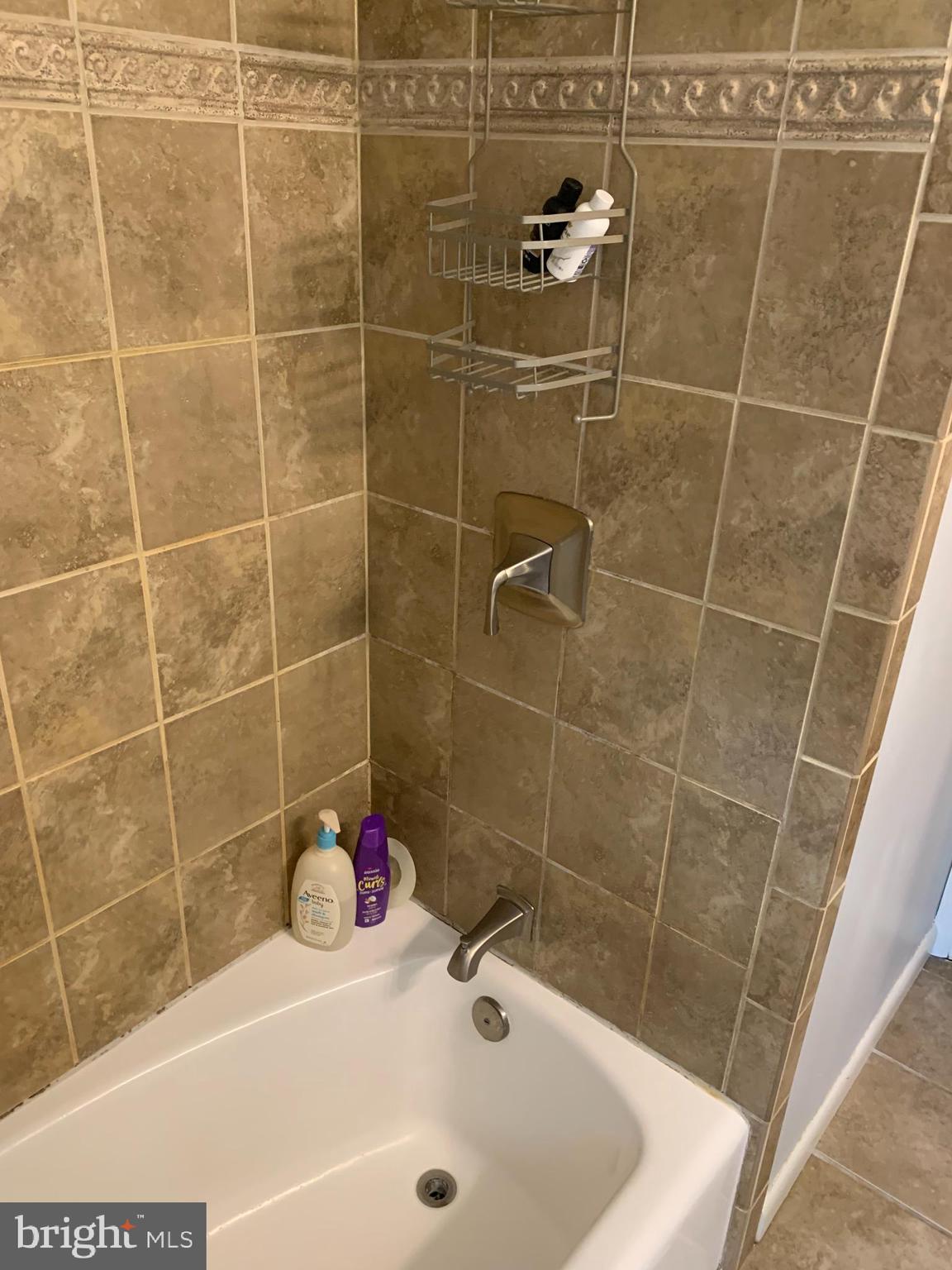 2605 Harrington Road Chester, MD 21619 - Photo 22 of 27 a bathroom with a shower