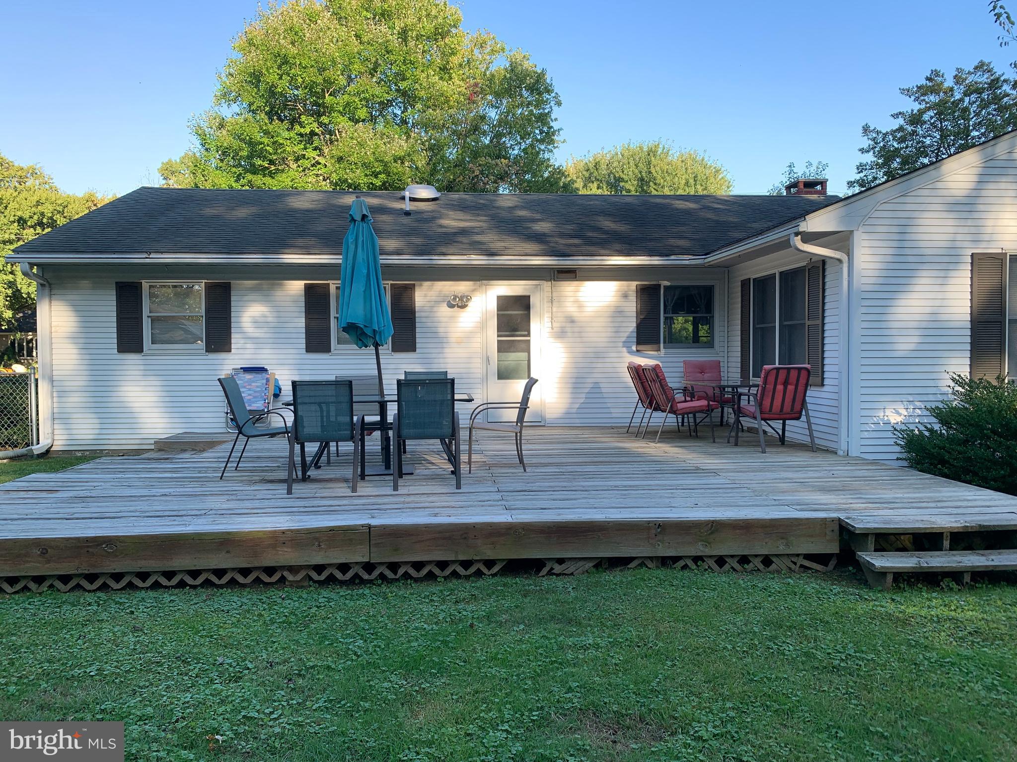 2605 Harrington Road Chester, MD 21619 - Photo 26 of 27 a view of outdoor space yard deck patio and swimming pool
