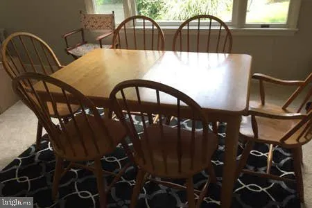 a view of entryway with a front door