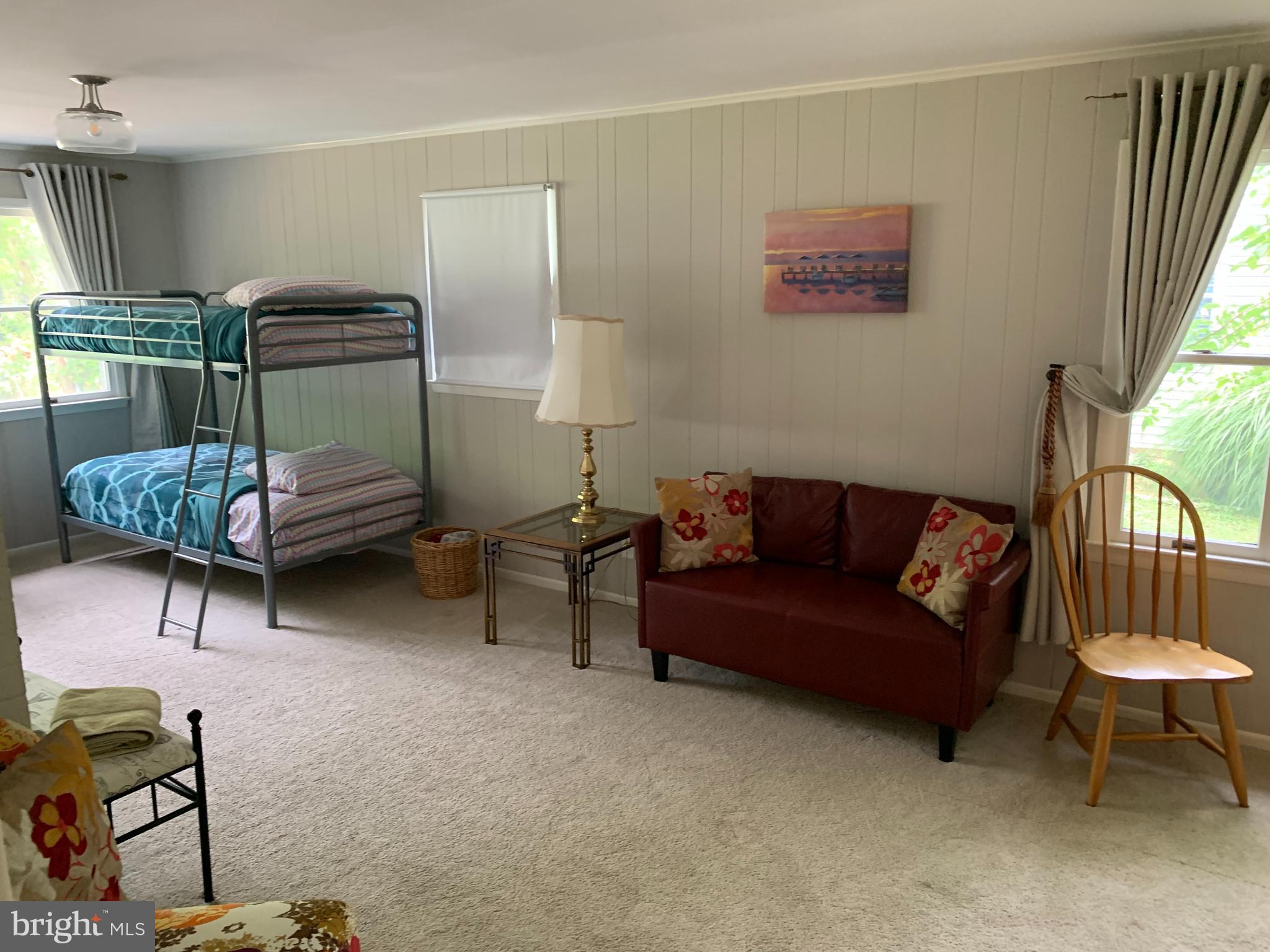 2605 Harrington Road Chester, MD 21619 - Photo 7 of 27 a living room with furniture and a window