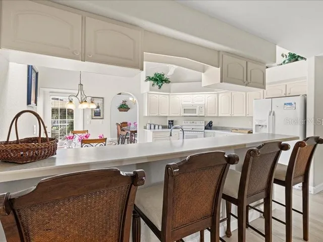 a bedroom with a bed and a cabinets