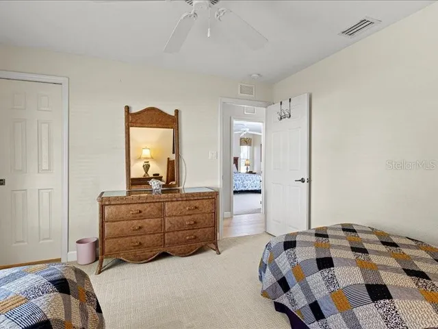 a view of a backyard with porch and patio