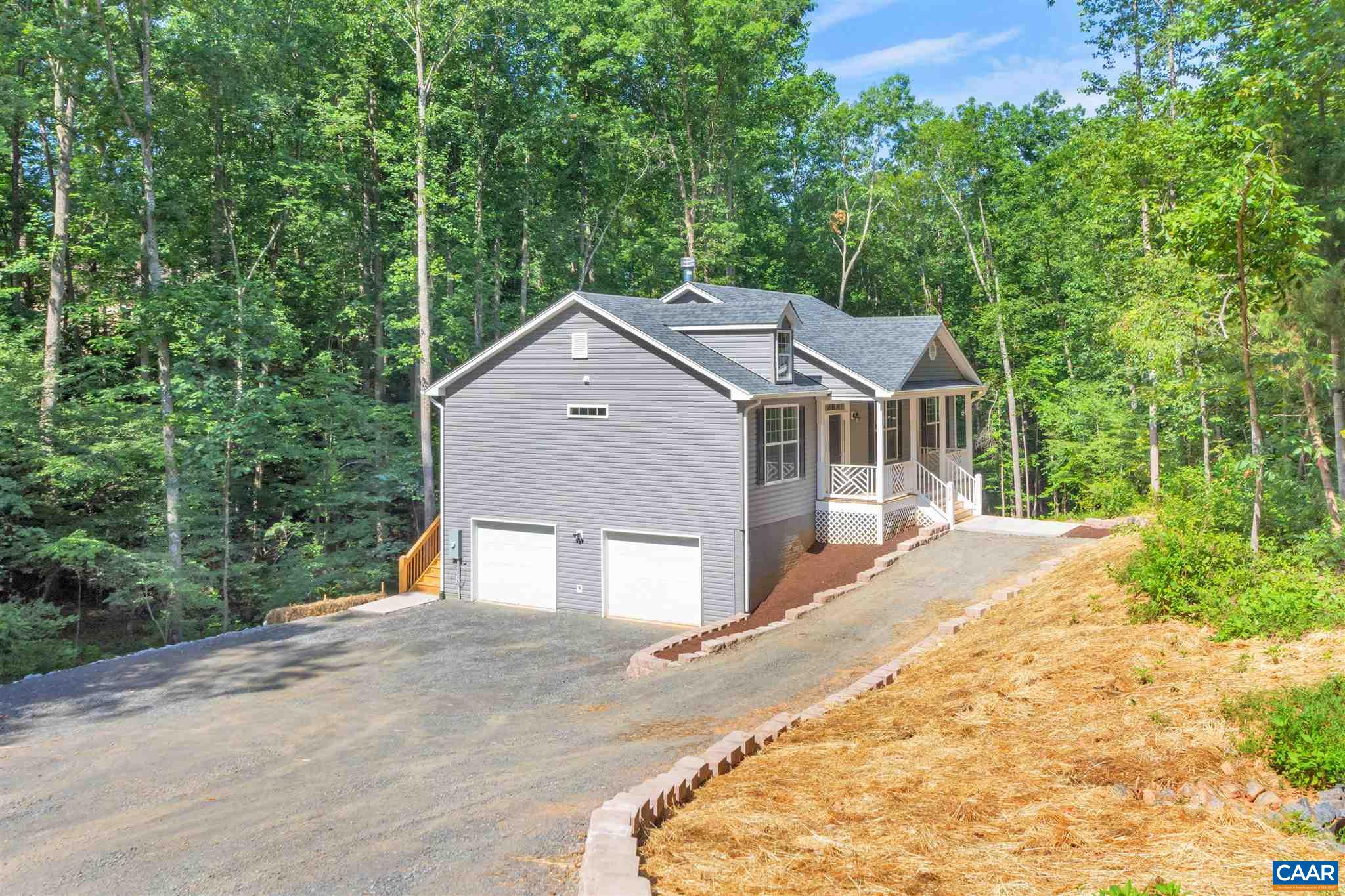 312 Jonquil Road Ruckersville, VA 22968 - Photo 25 of 34 front view of a house with a yard