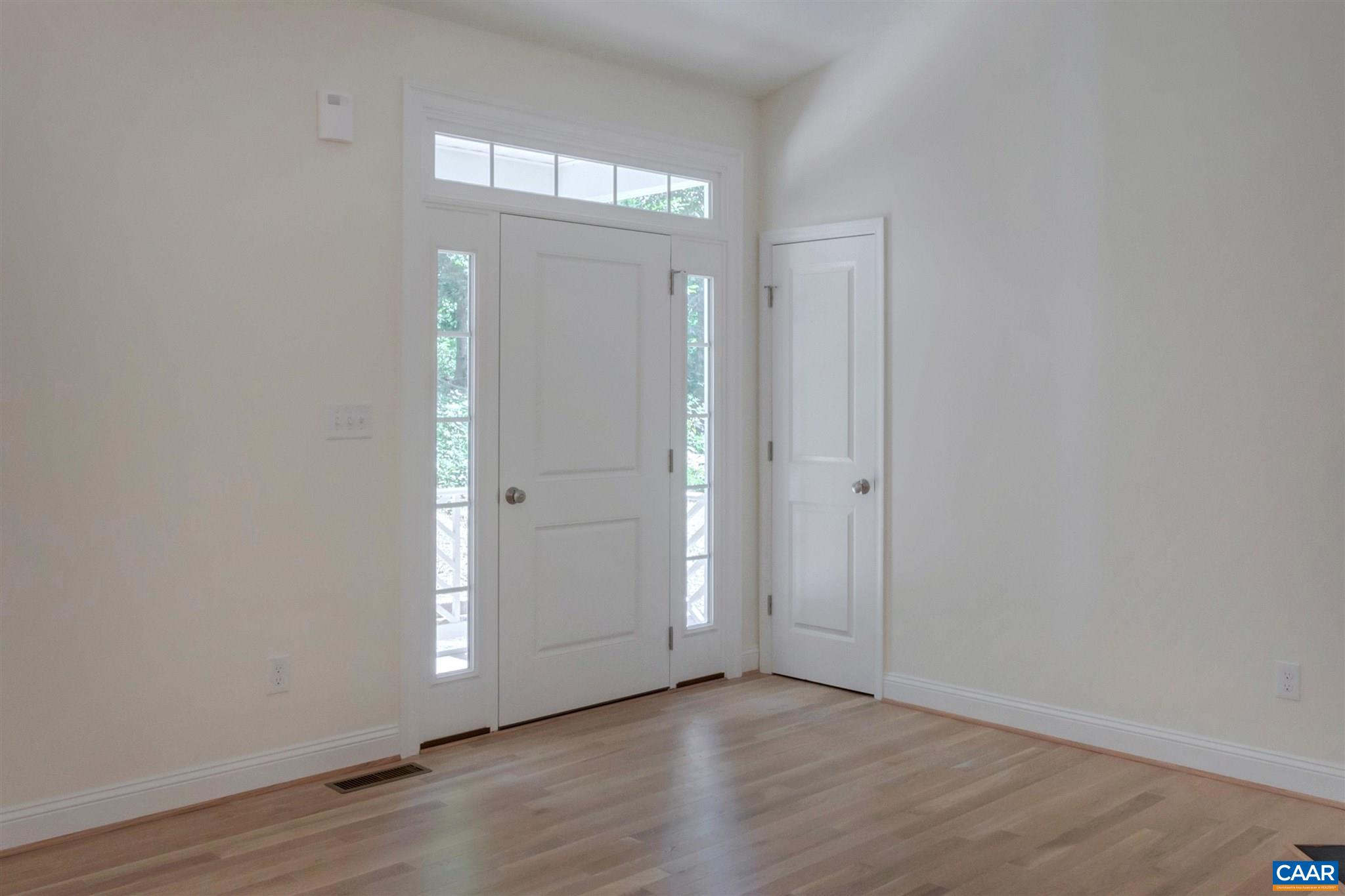 312 Jonquil Road Ruckersville, VA 22968 - Photo 5 of 34 a view of an empty room with wooden floor
