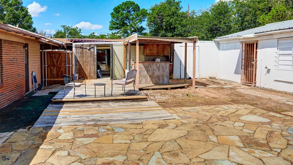 2612 West Rochelle Road Irving, TX 75062 - Photo 20 of 29 View of patio / terrace with a deck