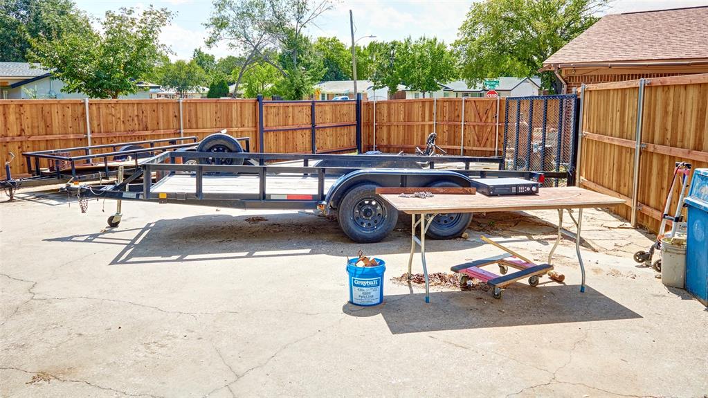 2612 West Rochelle Road Irving, TX 75062 - Photo 23 of 29 View of car parking featuring a fenced backyard. Room for boat, RV or several cars. Fenced area.