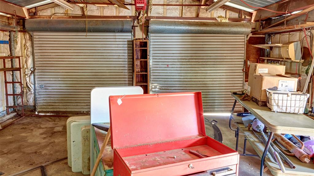 2612 West Rochelle Road Irving, TX 75062 - Photo 25 of 29 Two car garage, workshop and storage.