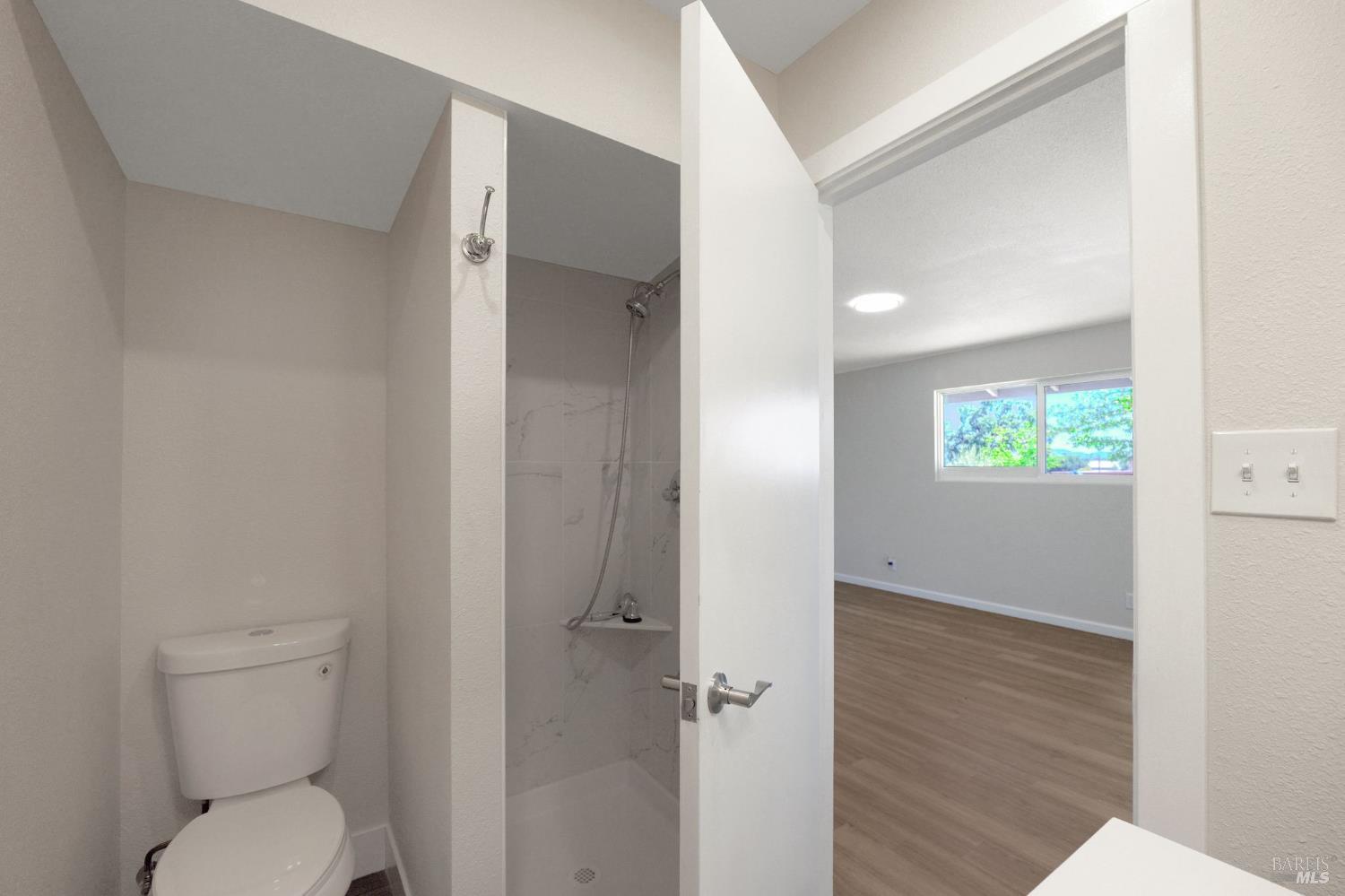 1120 Soda Canyon Road Napa, CA 94558 - Photo 20 of 38 a bathroom with a toilet and a shower