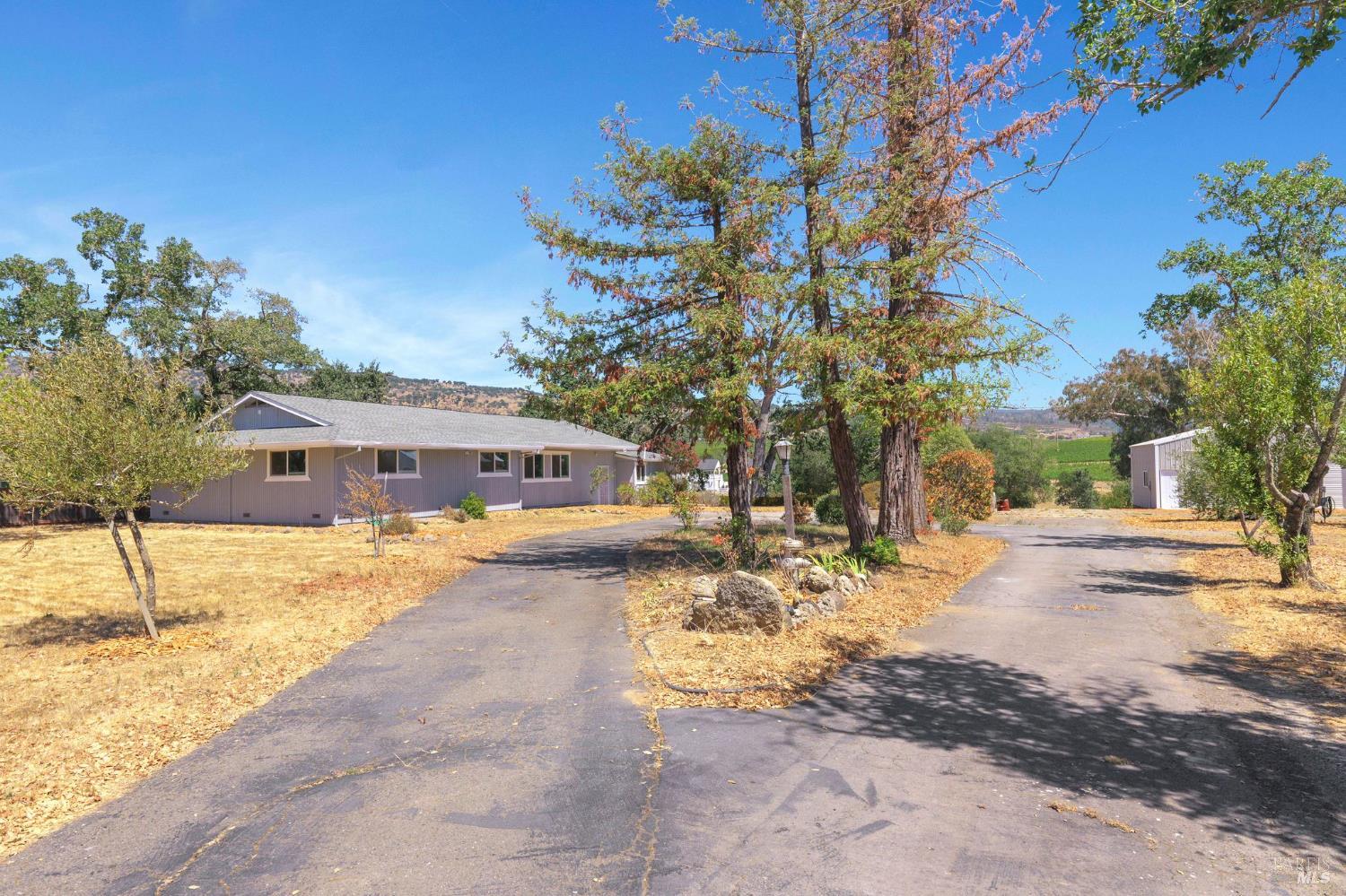 1120 Soda Canyon Road Napa, CA 94558 - Photo 3 of 38 a view of a house with snow on the road