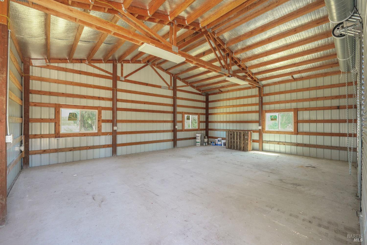 1120 Soda Canyon Road Napa, CA 94558 - Photo 34 of 38 a view of an empty room with windows