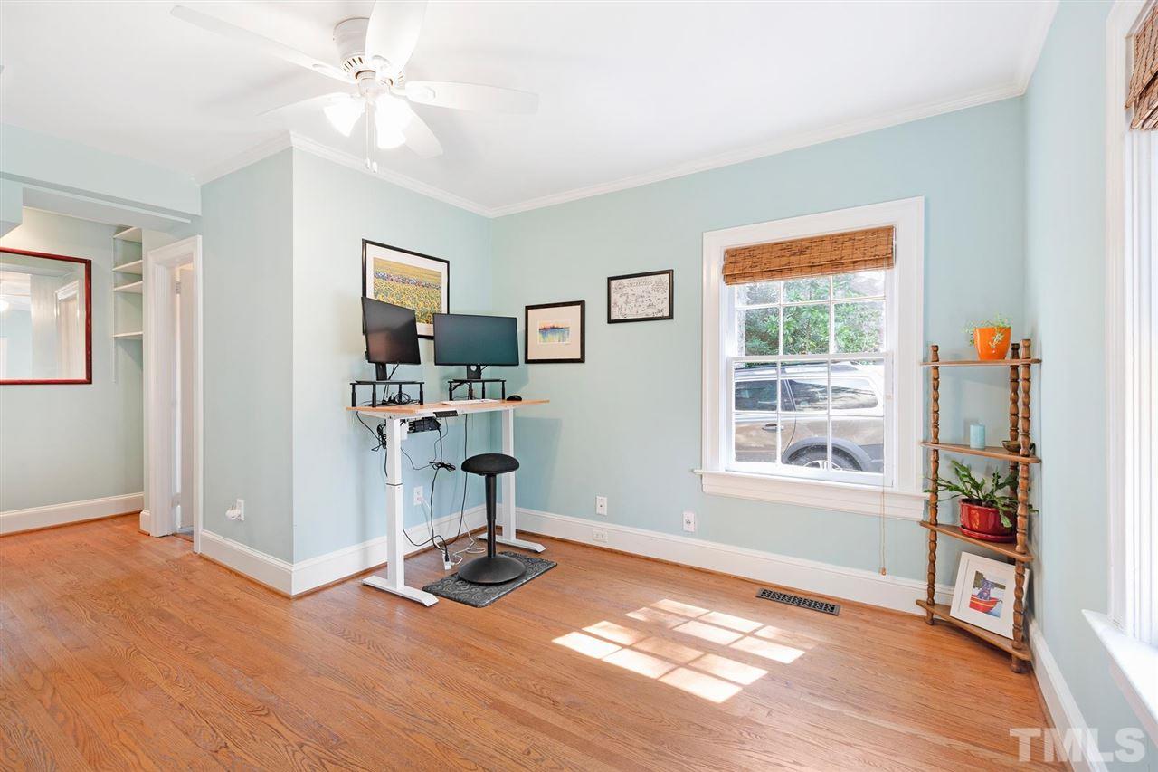 902 Lake Boone Trail Raleigh, NC 27607 - Photo 20 of 30 a view of a livingroom with a furniture wooden floor and a window