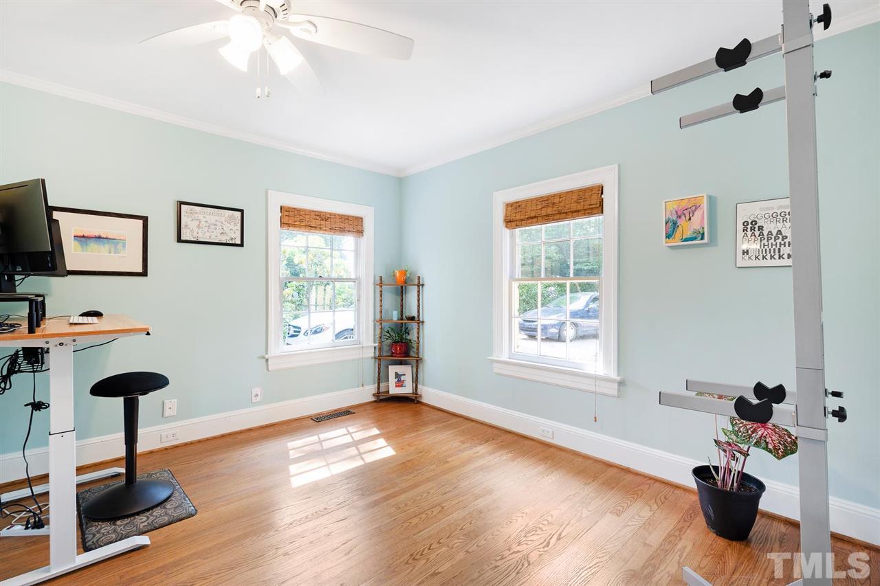 902 Lake Boone Trail Raleigh, NC 27607 - Photo 21 of 30 a view of a livingroom with workspace and a window