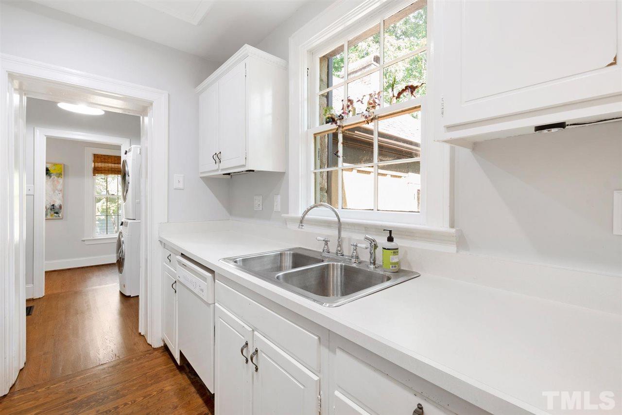 902 Lake Boone Trail Raleigh, NC 27607 - Photo 25 of 30 a kitchen with a sink and a window