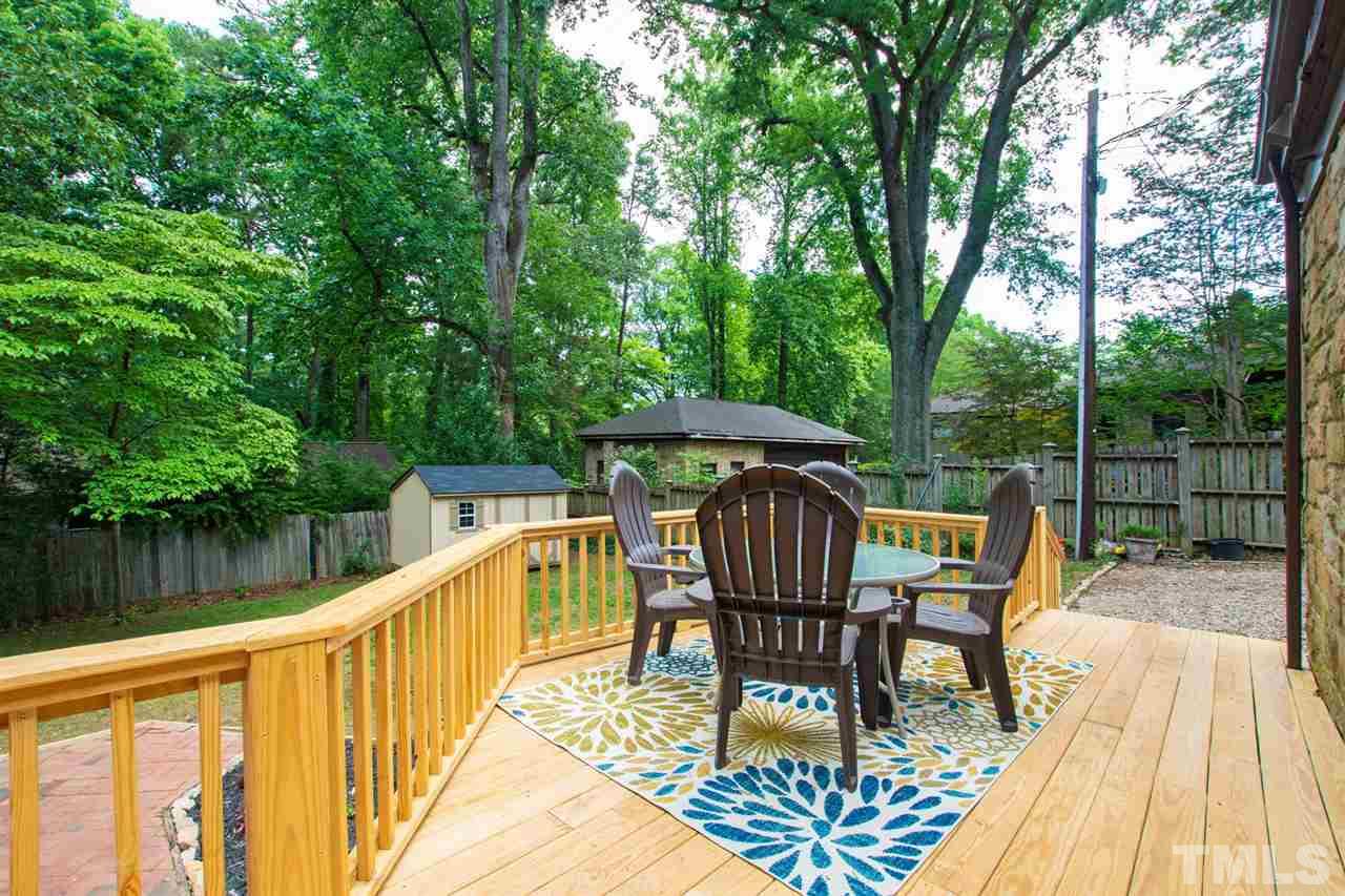 902 Lake Boone Trail Raleigh, NC 27607 - Photo 9 of 30 a view of backyard with deck and outdoor seating