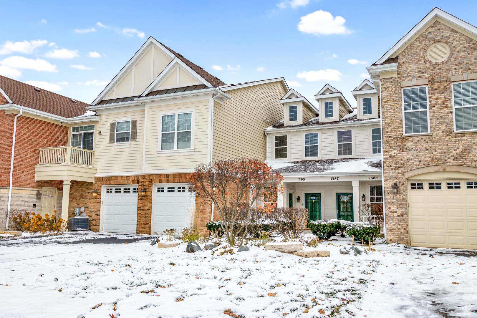 1391 Scarboro Road, Unit 201 Schaumburg, IL 60193 - Photo 1 of 20 a front view of a house