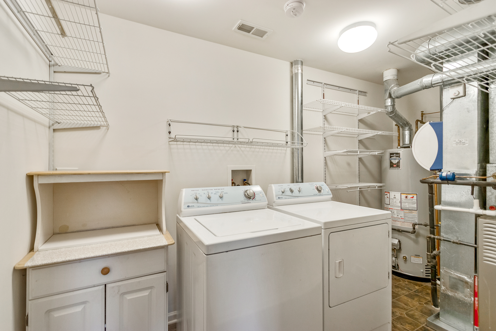 1391 Scarboro Road, Unit 201 Schaumburg, IL 60193 - Photo 18 of 20 a utility room with dryer and washer