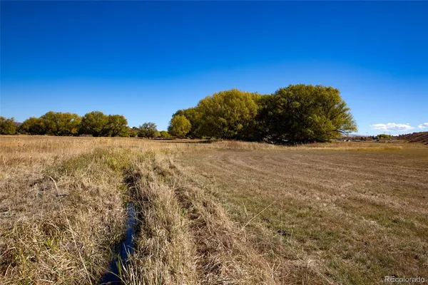 a view of ocean with a house