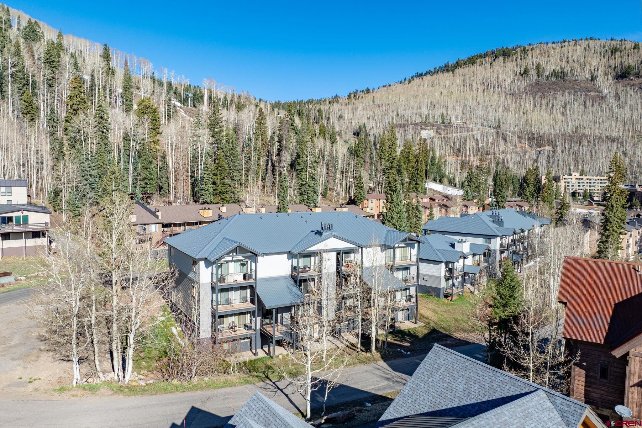 395 Sheol Street, Unit 117 Durango, CO 81301 - Photo 27 of 28 a view of patio with table and chairs and potted plants
